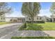 Well-maintained single-story home featuring a carport and a nicely landscaped front yard at 3283 Westpointe Dr, Franklin, IN 46131