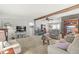 Open-concept living room offering seamless flow for entertaining guests and relaxing at 3283 Westpointe Dr, Franklin, IN 46131