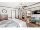 Bright main bedroom with a ceiling fan, and ensuite bathroom at 3283 Westpointe Dr, Franklin, IN 46131