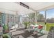 Bright and airy sunroom with comfortable seating and views of the backyard at 3283 Westpointe Dr, Franklin, IN 46131