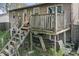 The property includes a wooden deck accessible by a set of stairs at 3432 Joan Pl, Indianapolis, IN 46226