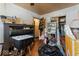 This bedroom has hardwood floors, a dark headboard with lights and storage, and a closet at 3432 Joan Pl, Indianapolis, IN 46226