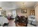 Open dining room with dark wood flooring and chandelier at 3432 Joan Pl, Indianapolis, IN 46226