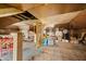 Unfinished attic space showing exposed beams and offering potential for storage or renovation at 3515 Guilford Ave, Indianapolis, IN 46205