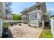 Backyard patio with seating and fire pit, perfect for outdoor entertaining at 3515 Guilford Ave, Indianapolis, IN 46205