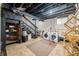 Basement laundry area, including a washer and dryer and staircase at 3515 Guilford Ave, Indianapolis, IN 46205