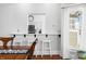 Open dining area with breakfast bar, offering kitchen view and natural light at 3515 Guilford Ave, Indianapolis, IN 46205