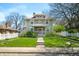 Charming two-story home with a classic design and well-manicured lawn at 3515 Guilford Ave, Indianapolis, IN 46205