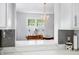 Marble countertop in a kitchen provides a glimpse into an adjacent dining room at 3515 Guilford Ave, Indianapolis, IN 46205