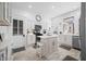 Bright kitchen with white cabinets, stainless steel appliances, and a center island at 3515 Guilford Ave, Indianapolis, IN 46205