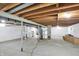 Spacious unfinished basement featuring exposed ceiling, concrete floor, and utility access at 3538 Cecil Ave, Indianapolis, IN 46226