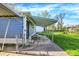Outdoor patio and grassy area is ideal for relaxation, fun, and outdoor entertaining at 3538 Cecil Ave, Indianapolis, IN 46226