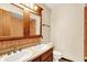 Well-appointed bathroom featuring a double sink vanity with tile backsplash at 3875 Arrowhead Ct, Greenfield, IN 46140