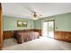 Generous main bedroom with private access to the deck and backyard at 3875 Arrowhead Ct, Greenfield, IN 46140