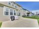Exterior of home showcasing a backyard with green grass, a patio, and a black wrought iron fence at 3997 Spylaw Rd, Bargersville, IN 46106