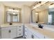 Modern bathroom featuring double sinks, white cabinets, quartz countertops, and stylish lighting fixtures at 3997 Spylaw Rd, Bargersville, IN 46106