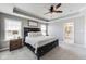 Spacious main bedroom features a tray ceiling, neutral color palette, and ensuite bathroom at 3997 Spylaw Rd, Bargersville, IN 46106