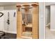 A custom built-in wooden sauna is one of the features of this beautifully designed home gym at 3997 Spylaw Rd, Bargersville, IN 46106