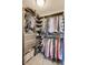 Organized walk-in closet with custom shelving, drawers, and ample hanging space for clothes and shoes at 3997 Spylaw Rd, Bargersville, IN 46106