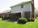 Back patio with awning, picnic table and grill, perfect for outdoor dining and entertainment at 4166 Cobblestone Way, Greenwood, IN 46143