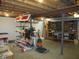 Unfinished basement featuring an area used for a hobby workspace and storage at 4166 Cobblestone Way, Greenwood, IN 46143