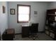 Bedroom featuring a desk, sewing machine, and bookcase at 4166 Cobblestone Way, Greenwood, IN 46143
