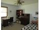 Bedroom featuring a desk and bed with a decorative quilt at 4166 Cobblestone Way, Greenwood, IN 46143