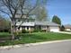 Charming two-story home with brick facade, attached garage, and well-manicured front yard at 4166 Cobblestone Way, Greenwood, IN 46143