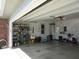 Open garage with storage shelves and tools at 4166 Cobblestone Way, Greenwood, IN 46143