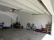 Spacious garage featuring tools and a lawn mower at 4166 Cobblestone Way, Greenwood, IN 46143