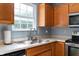 Traditional kitchen featuring stainless steel appliances, a double sink, and oak cabinets at 419 Old Glory Dr, Greenfield, IN 46140