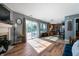 Spacious living room showcasing an open floor plan leading into the kitchen and outdoor access at 419 Old Glory Dr, Greenfield, IN 46140