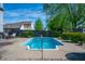 Refreshing pool area with access steps and surrounding landscaping at 419 Old Glory Dr, Greenfield, IN 46140