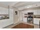 Spacious kitchen featuring stainless steel appliances, granite countertops, and white cabinetry at 4260 Springwood Trl, Indianapolis, IN 46228