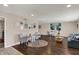 Spacious living room features hardwood floors, neutral walls, and stylish furniture at 4260 Springwood Trl, Indianapolis, IN 46228