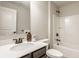 Clean bathroom with modern fixtures, a vanity sink, and a shower-tub combo at 4428 Voyageur Way, Carmel, IN 46074