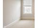 Comfortable bedroom features a window that provides plenty of natural light at 4428 Voyageur Way, Carmel, IN 46074