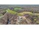 Aerial view of rural house and surrounding green countryside at 4976 W Sims Ln, Monrovia, IN 46157