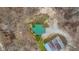 Aerial view of house showing roof, outbuilding, and gravel driveway at 4976 W Sims Ln, Monrovia, IN 46157