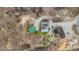 Aerial view of the property showcasing the home's roof and surrounding land at 4976 W Sims Ln, Monrovia, IN 46157