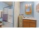 Functional bathroom with a shower-tub combo and a vanity with storage at 4976 W Sims Ln, Monrovia, IN 46157