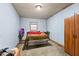 Cozy bedroom with a queen bed, small window and a closet at 4976 W Sims Ln, Monrovia, IN 46157