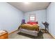 Cozy bedroom with a queen bed, small window and a closet at 4976 W Sims Ln, Monrovia, IN 46157