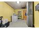 Bright laundry room with washer, dryer, shelving, and ample storage space at 4976 W Sims Ln, Monrovia, IN 46157