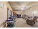 Cozy living room featuring carpet floors, a ceiling fan, and natural light at 4976 W Sims Ln, Monrovia, IN 46157