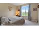 Comfortable bedroom with a large window and a view of the outdoors at 52 E 286Th St, Atlanta, IN 46031