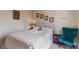 Charming bedroom featuring a cozy bed, decorative wall art, and a comfortable chair at 52 E 286Th St, Atlanta, IN 46031