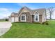 Brick home with a well-maintained lawn, showcasing a beautiful exterior and mature landscaping at 52 E 286Th St, Atlanta, IN 46031