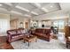 Spacious living room featuring hardwood floors, coffered ceilings, an open floor plan, and a neutral color palette at 52 E 286Th St, Atlanta, IN 46031