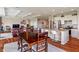 Open concept living and dining area with access to kitchen and fireplace at 52 E 286Th St, Atlanta, IN 46031